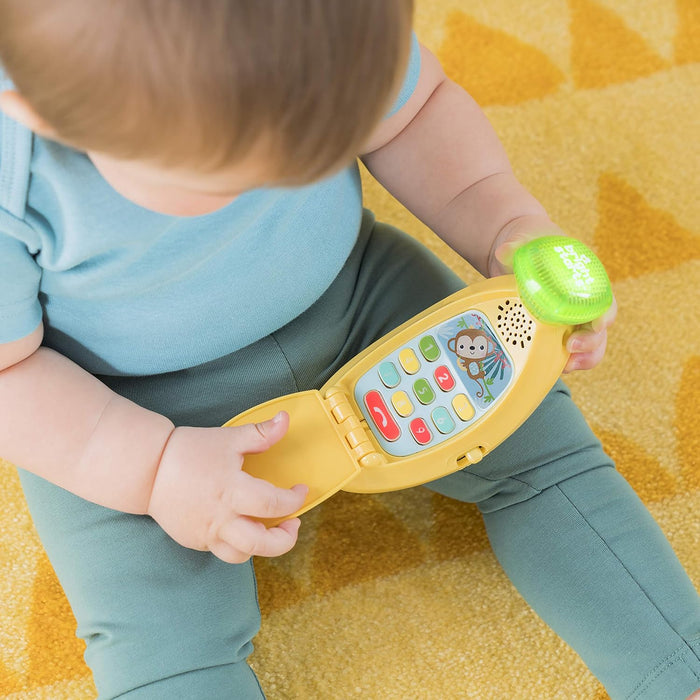 Bright Starts Babblin’ Banana Ring & Sing Light-Up Musical Baby Toy Flip Phone, 6 Months+