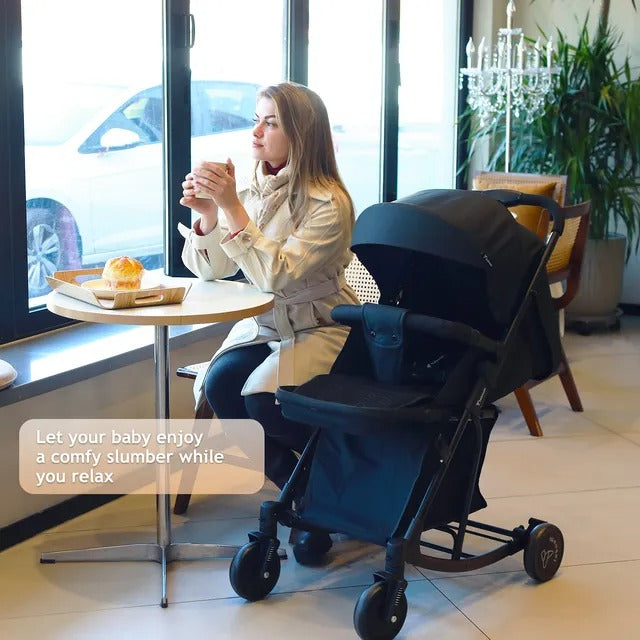 Teknum Stroller with Rocker & Red Diaper Tote Bag – Black.