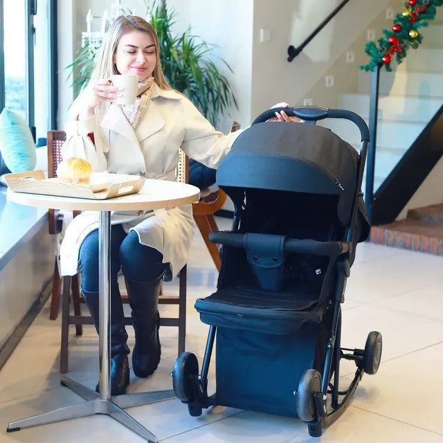 Teknum Stroller with Rocker & Red Diaper Tote Bag – Black.